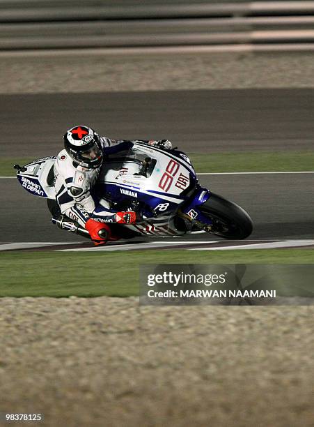 Jorge Lorenzo of Fiat Yamaha Team races during the 2010 MotoGP free qualification parctice at the Losail International Circuit in Doha on April 10,...