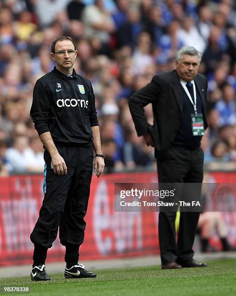 Martin O'Neill , Manager of Aston Villa looks on with Carlo Ancelotti, Manager of Chelsea during the FA Cup sponsored by E.ON Semi Final match...