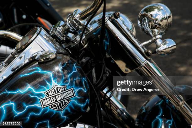 Harley-Davidson logo adorns a bike outside of the Harley-Davidson of New York City showroom store, June 25, 2018 in the Queens borough of New York...