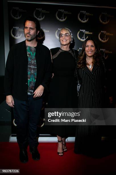 Director Adam Rothlein, actress Sharon Stone and director Price Arana attend the Paris Art and Movie Awards ceremony at Le Grand Rex on June 25, 2018...