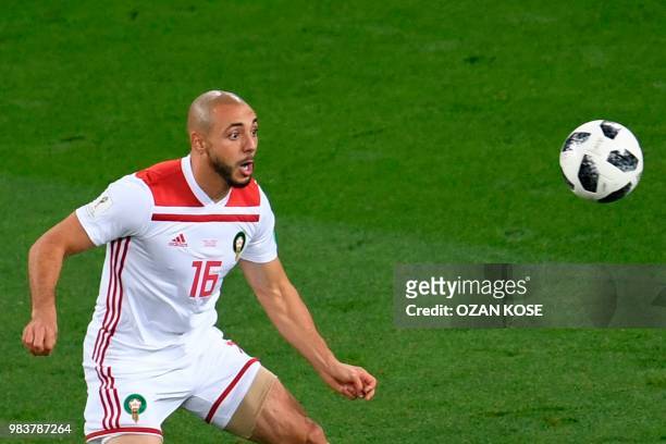 Morocco's forward Noureddine Amrabat eyes the ball during the Russia 2018 World Cup Group B football match between Spain and Morocco at the...