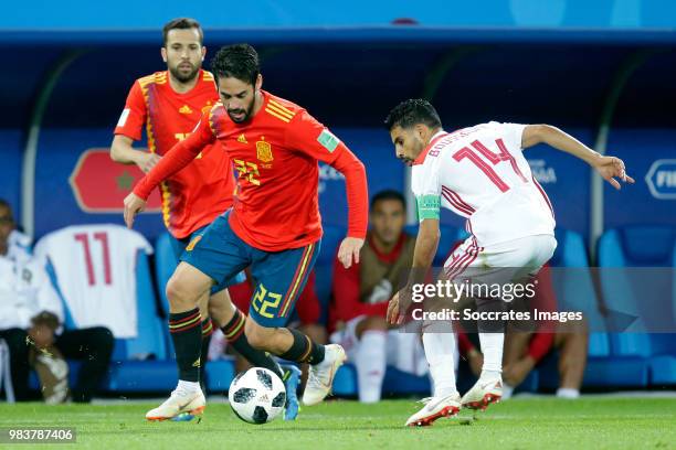 Isco of Spain, Mbark Boussoufa of Morocco during the World Cup match between Spain v Morocco at the Kaliningrad Stadium on June 25, 2018 in...