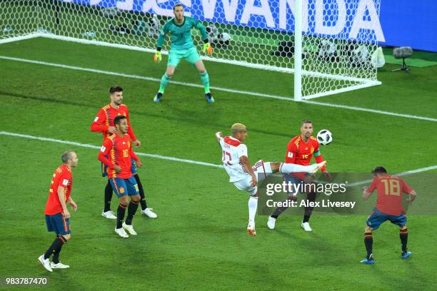 Nabil Dirar of Morocco controls the ball in the Spain box under pressure from Sergio Ramos of Spain during the 2018 FIFA World Cup Russia group B...