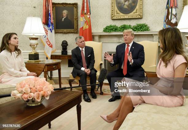 President Donald Trump, second right, speaks as Rania Al-Abdullah, Queen of Jordan, from left, King Abdullah II of Jordan, and First Lady Melania...