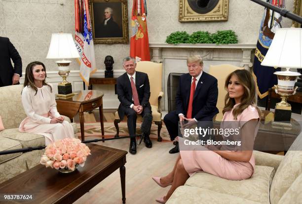 Rania Al-Abdullah, Queen of Jordan, from left, King Abdullah II of Jordan, U.S. President Donald Trump and First Lady Melania Trump, sit during a...