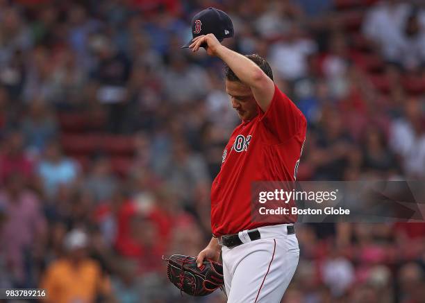 Boston Red Sox starting pitcher Steven Wright is pictured after giving up his fourth run during the first inning. The Boston Red Sox host the Seattle...