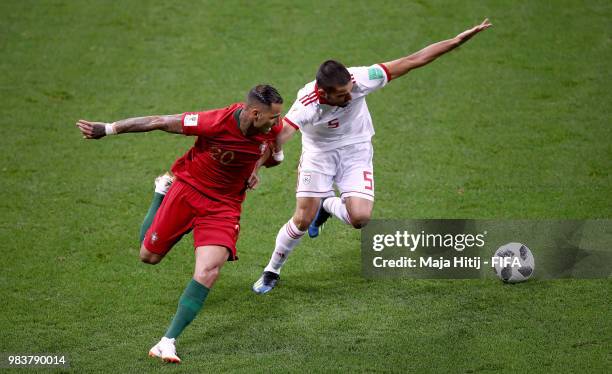 Ricardo Quaresma of Portugal battles for possession with Milad Mohammadi of Iran during the 2018 FIFA World Cup Russia group B match between Iran and...