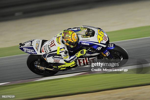 Valentino Rossi of Italy and Fiat Yamaha Team rounds a bend during the second day of testing ahead of the Qatar Grand Prix at Losail Circuit on April...