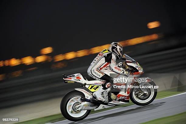 Randy De Puniet of France and LCR Honda MotoGP heads down a straight during the second day of testing ahead of the Qatar Grand Prix at Losail Circuit...