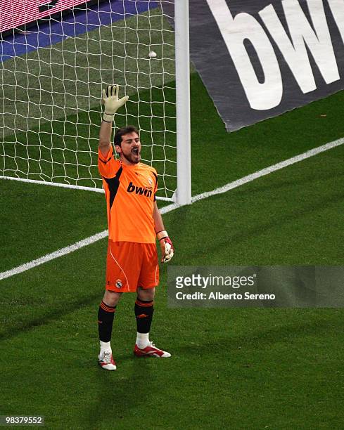 Iker Casillas of Real Madrid gives instructions to his teammates during the La Liga match between Real Madrid and Barcelona at Estadio Santiago...