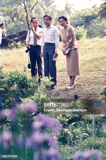 Crown Prince Akihito and Crown Princess Michiko visit the University of Tokyo Nikko Botanical Garden on June 5, 1987 in Nikko, Tochigi, Japan.