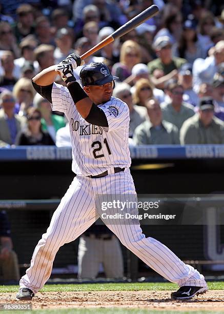 Catcher Miguel Olivo of the Colorado Rockies takes an at bat against the San Diego Padres during MLB action on Opening Day at Coors Field on April 9,...