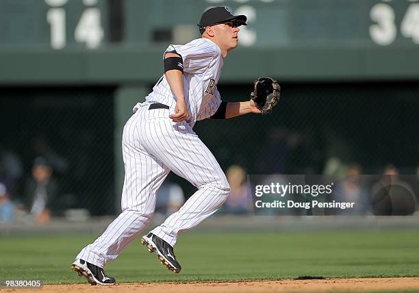 Second baseman Clint Barmes of the Colorado Rockies plays defense against the San Diego Padres during MLB action on Opening Day at Coors Field on...