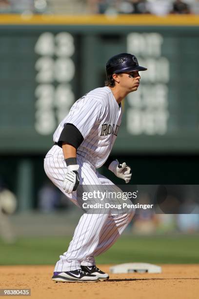 Troy Tulowitzki of the Colorado Rockies takes a lead off second base against the San Diego Padres during MLB action on Opening Day at Coors Field on...
