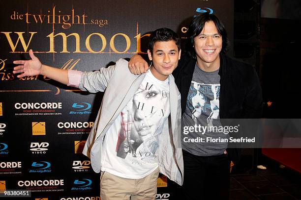 Actor Bronson Pelletier and actor Chaske Spencer attend the 'Twilight: New Moon' fan-event at Hangar 2 of the Tempelhof Airport on April 10, 2010 in...