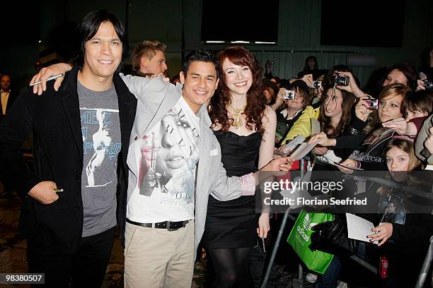 Actor Chaske Spencer and actress Bryce Dallas Howard and actor Bronson Pelletier attend the 'Twilight: New Moon' fan-event at Hangar 2 of the...