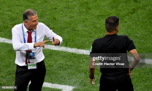 Carlos Queiroz, Head coach of Iran argues with Referee Enrique Caceres during the 2018 FIFA World Cup Russia group B match between Iran and Portugal...