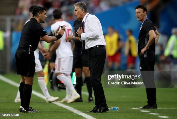 Carlos Queiroz, Head coach of Iran argues with Referee Enrique Caceres during the 2018 FIFA World Cup Russia group B match between Iran and Portugal...