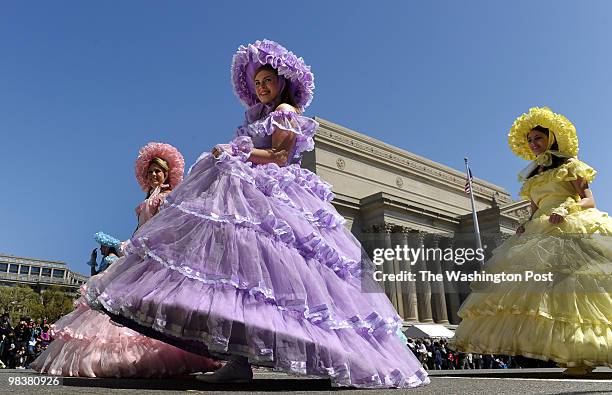 Young ladies of the Eastern Shore Optimist Club Dogwood Trail Court in Baldwin County, Alabama walk in the parade route down Constitution Ave. During...