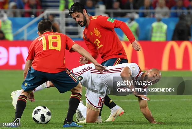 Spain's defender Jordi Alba and Spain's midfielder Isco vie with Morocco's forward Noureddine Amrabat during the Russia 2018 World Cup Group B...