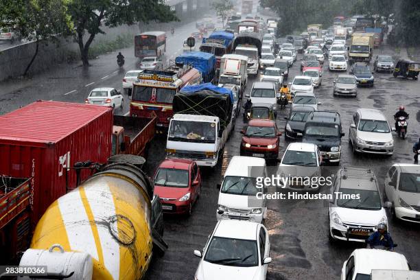 Heavy rains causes Sion-Panvel highway at Turbhe on June 25, 2018 in Navi Mumbai, India. Heavy downpour led to waterlogging at several places...