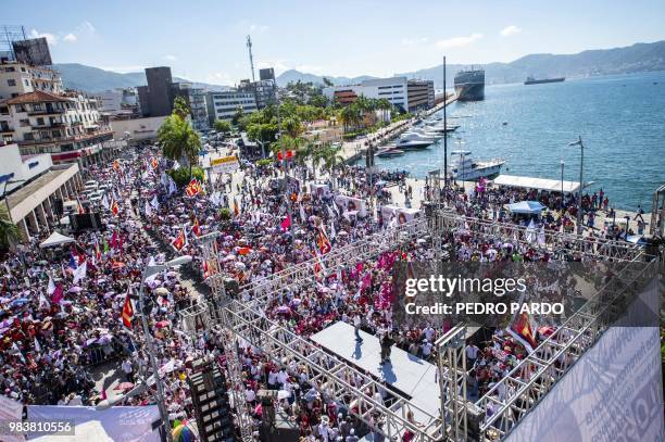 Supporters of Mexico's presidential candidate for the MORENA party, Andres Manuel Lopez Obrador, gather for a campaign rally in Acapulco, Guerrero...