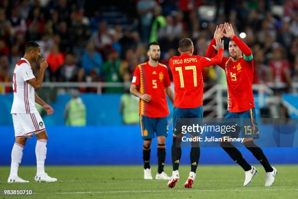 Iago Aspas of Spain celebrates with teammate Sergio Ramos after scoring his team's second goal during the 2018 FIFA World Cup Russia group B match...