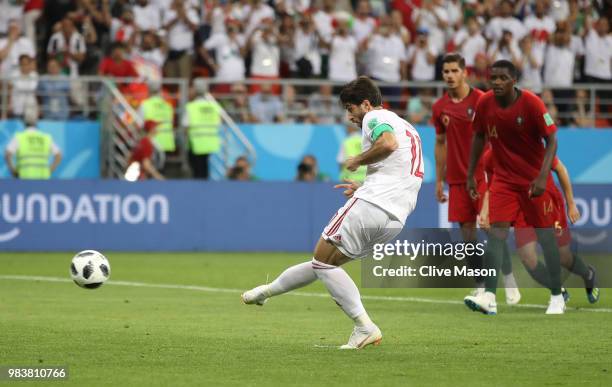 Karim Ansarifard of Iran scores his team's first goal from the peanlty spot during the 2018 FIFA World Cup Russia group B match between Iran and...