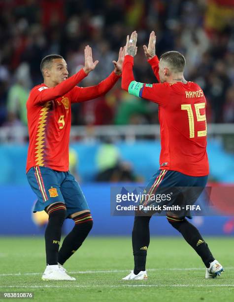 Rodrigo and Sergio Ramos of Spain celebrate after Iago Aspas of Spain scores their team's second goal during the 2018 FIFA World Cup Russia group B...