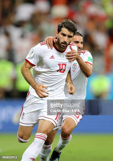 Karim Ansarifard of Iran celebrates after scoring his team's first goal during the 2018 FIFA World Cup Russia group B match between Iran and Portugal...