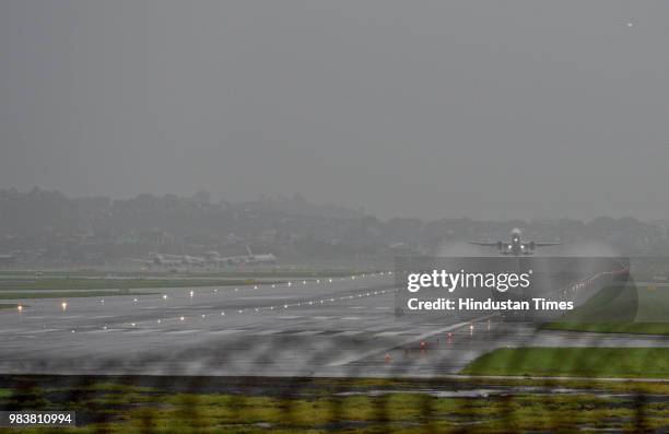 Low Visibility at Mumbai Airport on June 25, 2018 in Mumbai, India. Heavy downpour led to waterlogging at several places including roads in and...