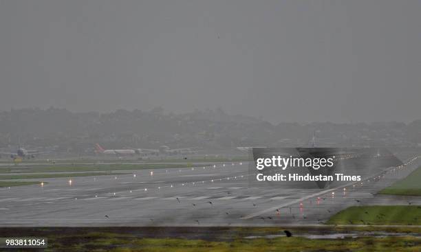 Low Visibility at Mumbai Airport on June 25, 2018 in Mumbai, India. Heavy downpour led to waterlogging at several places including roads in and...