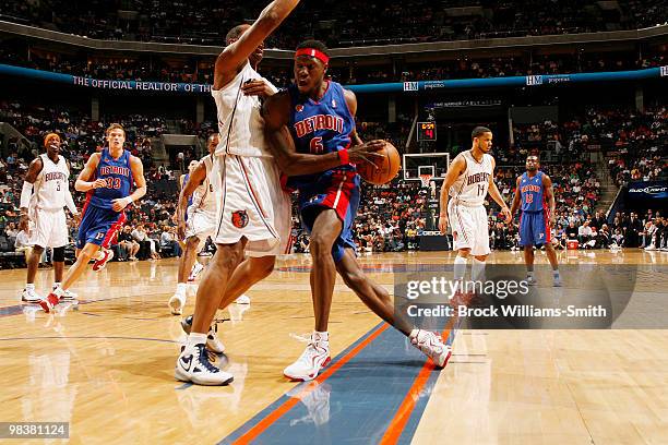 Boris Diaw of the Charlotte Bobcats guards against Ben Wallace of the Detroit Pistons on April 10, 2010 at the Time Warner Cable Arena in Charlotte,...