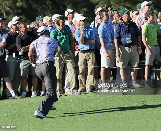 Tiger Woods of the US plays the 15th hole during the 3rd round of the Masters Golf Tournament at Augusta National Golf Club on April 10, 2010 in...