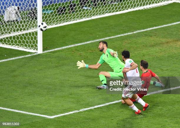 Mehdi Taremi of Iran shoots wide past Rui Patricio of Portugal during the 2018 FIFA World Cup Russia group B match between Iran and Portugal at...