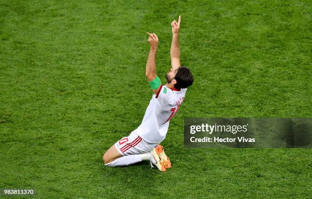 Karim Ansarifard of Iran celebrates after scoring his team's first goal during the 2018 FIFA World Cup Russia group B match between Iran and Portugal...