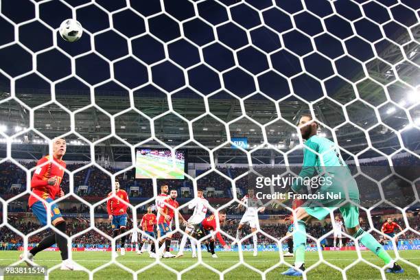 Youssef En Nesyri of Morocco scores his team's second goal past David De Gea of Spain during the 2018 FIFA World Cup Russia group B match between...