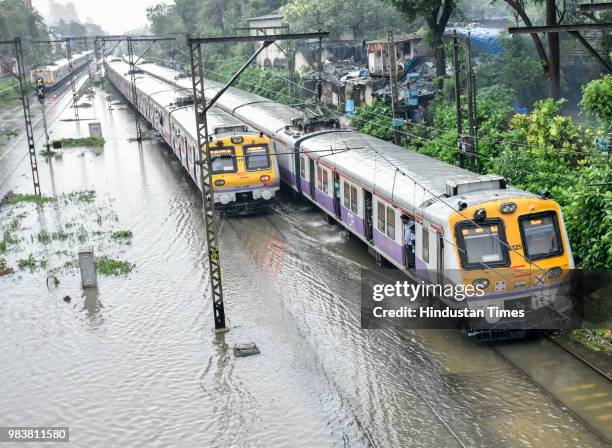 Water logging on railway track between Sion and Matunga after heavy rains on June 25, 2018 in Mumbai, India. Heavy downpour led to waterlogging at...