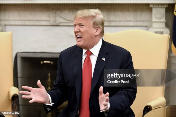 President Donald Trump speaks during a meeting with King Abdullah II of Jordan in the Oval Office of the White House on June 25, 2018 in Washington,...