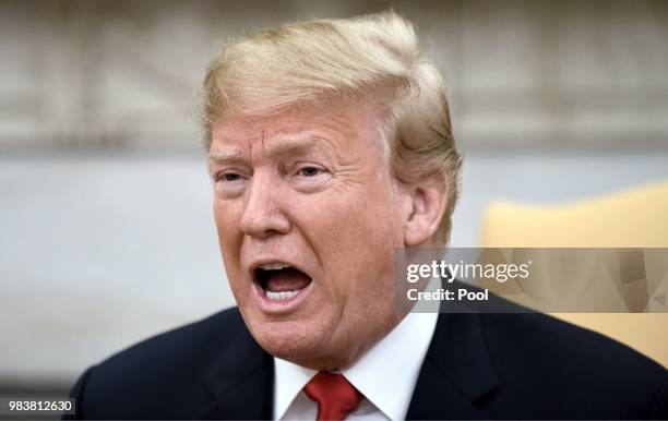 President Donald Trump speaks during a meeting with King Abdullah II of Jordan in the Oval Office of the White House on June 25, 2018 in Washington,...