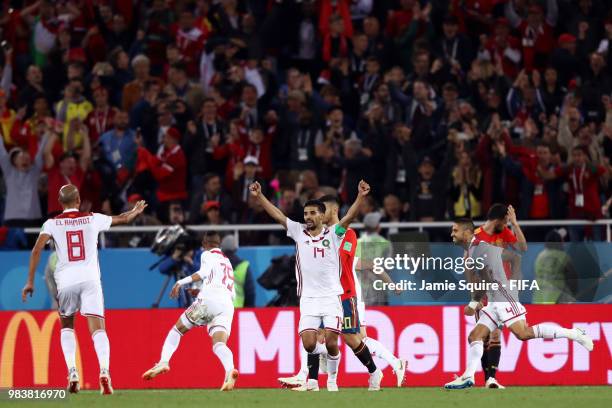 Mbark Boussoufa, Youssef En Nesyri and Karim El Ahmadi of Morocco celebrates after Youssef En Nesyri of Morocco scored their sides second goal during...