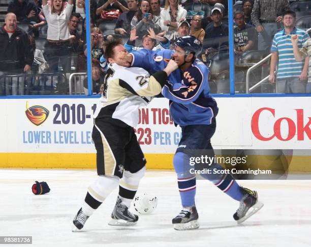 Evander Kane of the Atlanta Thrashers fights against Matt Cooke of the Pittsburgh Penguins at Philips Arena on April 10, 2010 in Atlanta, Georgia.