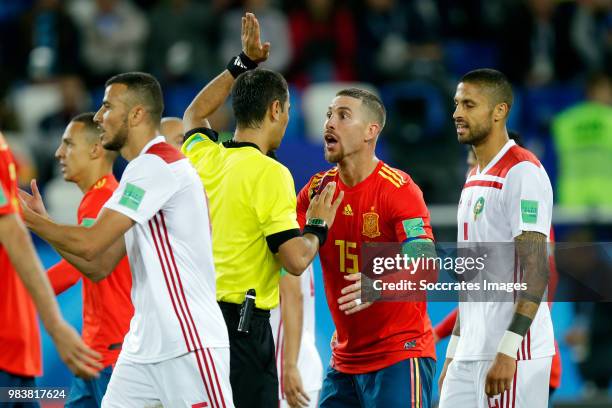 Referee Ravshan Irmatov, Sergio Ramos of Spain during the World Cup match between Spain v Morocco at the Kaliningrad Stadium on June 25, 2018 in...