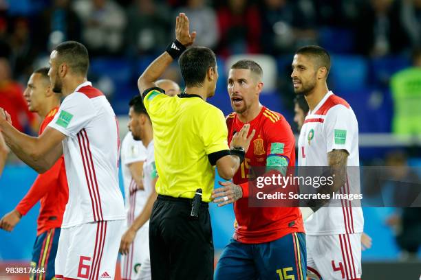 Referee Ravshan Irmatov, Sergio Ramos of Spain during the World Cup match between Spain v Morocco at the Kaliningrad Stadium on June 25, 2018 in...