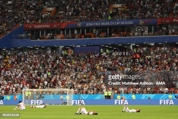 Morteza Pouraliganji of IR Iran lies dejectedly on the pitch at the end of the 2018 FIFA World Cup Russia group B match between Iran and Portugal at...