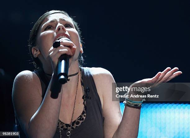 Singer Lena Meyer-Landrut performs during the 'Verstehen Sie Spass?' television show on April 10, 2010 in Halle, Germany.