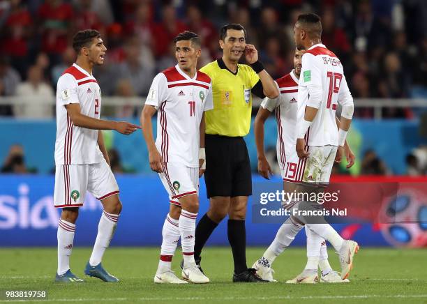 Referee Ravshan Irmatov speaks Morocco players during the 2018 FIFA World Cup Russia group B match between Spain and Morocco at Kaliningrad Stadium...