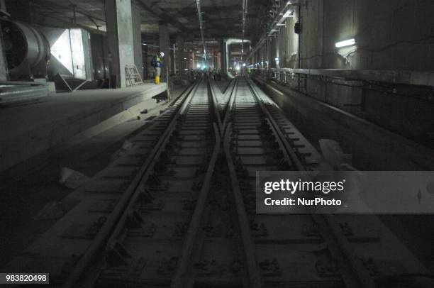 Workers quivered readiness rail on Mas Rapid Transiting at the station to HI Jakarta, June 2016. Mass Progres construction of mass rapid transit...