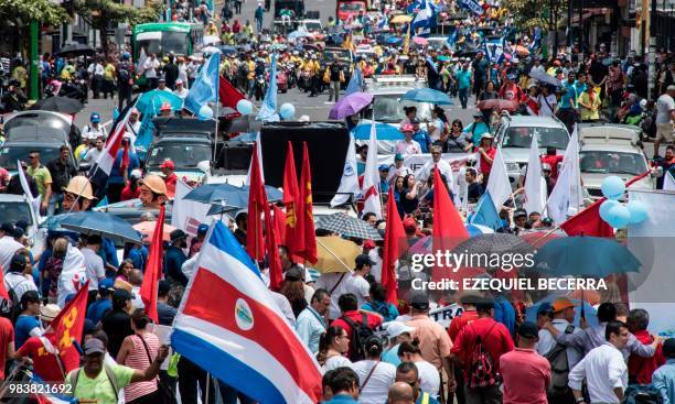 Thousands of workers of the public sector march during a strike called by labour unions to protest against austerity measures, in San Jose, June 25,...