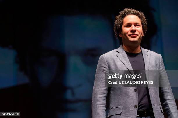 Venezuelan music conductor Gustavo Dudamel poses during a press conference in Santiago, on June 25, 2018. - The presentations of Gustavo Dudamel will...